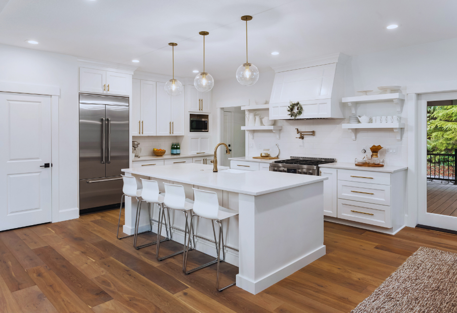 a kitchen with hardwood floor